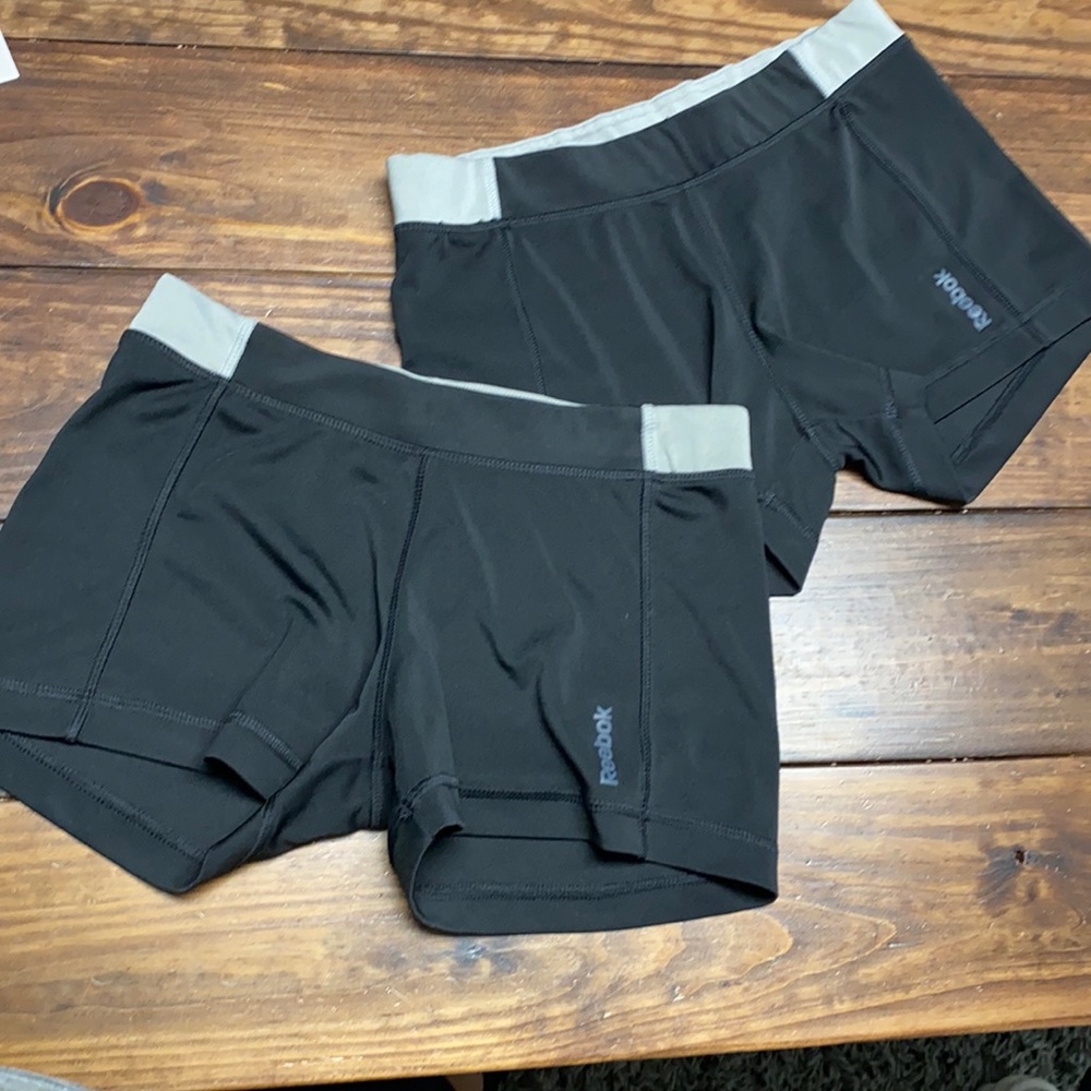 2 Pair of medium Reebok Workout Shorts